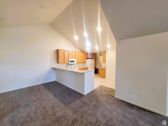 186 S 1900 W Unit R2, Lehi, UT 84043 - kitchen with white appliances, a peninsula, vaulted ceiling, carpet floors, and light countertops