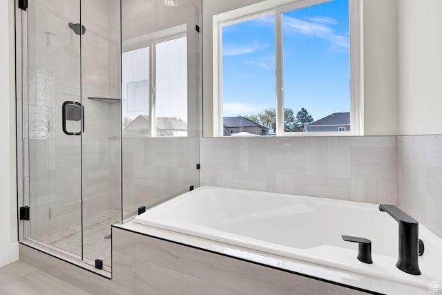 1765 W 650 S, Marriott Slaterville, UT 84404 - bathroom featuring a bath and a stall shower