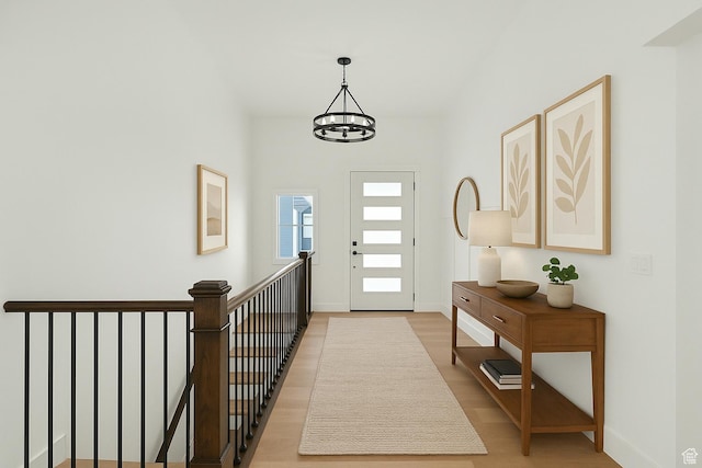 1765 W 650 S, Marriott Slaterville, UT 84404 - entryway featuring wood finished floors, baseboards, and a chandelier