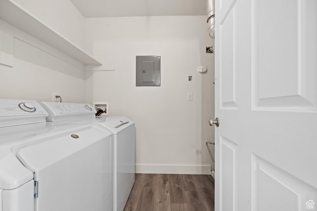 3860 S Mccall St E Unit 3C, Salt Lake City, UT 84115 - laundry room with electric panel, washing machine and dryer, baseboards, and dark wood-style flooring