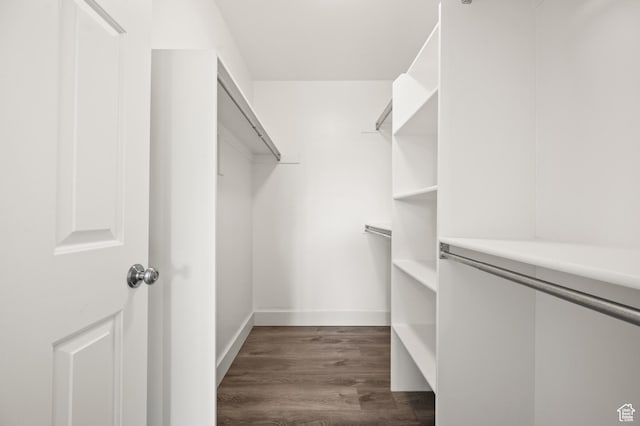 3860 S Mccall St E Unit 3C, Salt Lake City, UT 84115 - spacious closet featuring dark wood-style floors