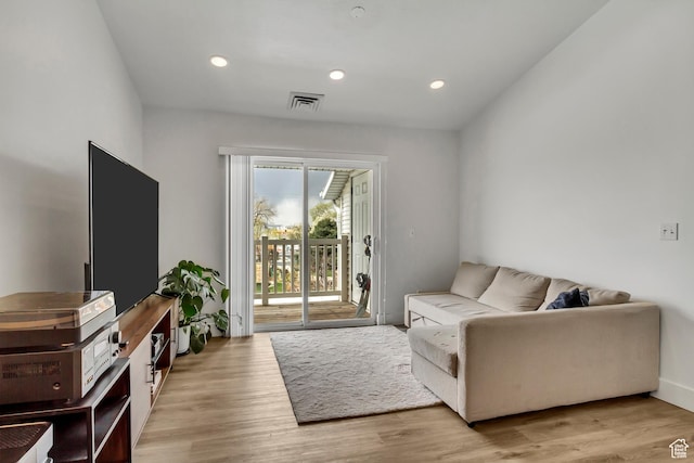 3860 S Mccall St E Unit 3C, Salt Lake City, UT 84115 - living area featuring wood finished floors and recessed lighting