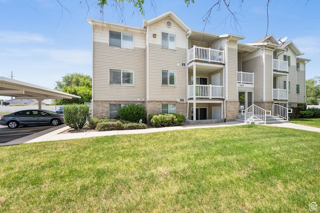 3860 S Mccall St E Unit 3C, Salt Lake City, UT 84115 - view of building exterior featuring covered parking