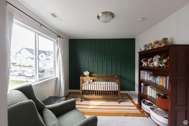 bedroom featuring multiple windows