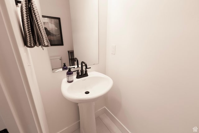 bathroom featuring baseboards