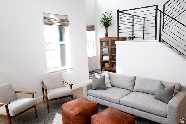 living room with wood finished floors and baseboards