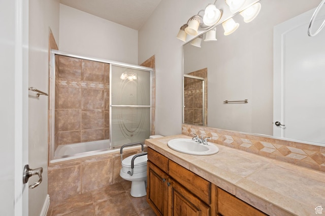 full bathroom with vanity, toilet, tiled shower / bath combo, and tile patterned floors