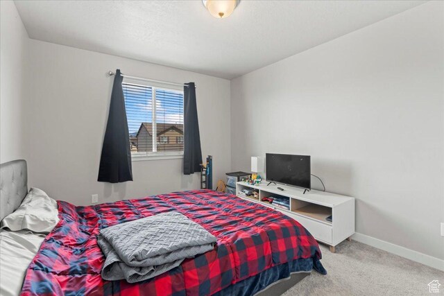 971 W Farnham Dr, North Salt Lake, UT 84054 - bedroom featuring light colored carpet and baseboards
