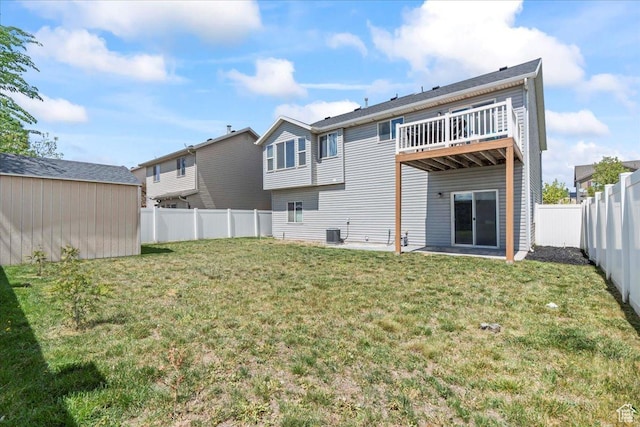 971 W Farnham Dr, North Salt Lake, UT 84054 - back of property featuring an outdoor structure and central air condition unit