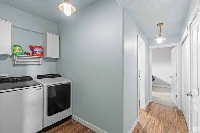 971 W Farnham Dr, North Salt Lake, UT 84054 - washroom with washing machine and clothes dryer, cabinet space, wood finished floors, and baseboards