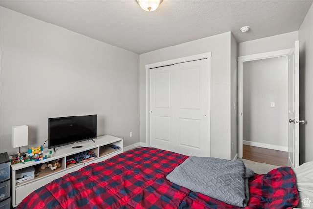 971 W Farnham Dr, North Salt Lake, UT 84054 - bedroom with baseboards and a closet