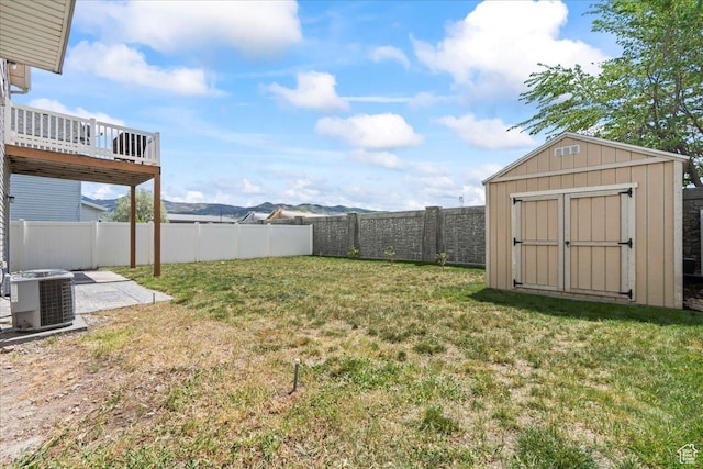 971 W Farnham Dr, North Salt Lake, UT 84054 - view of yard with central AC unit, a storage unit, and an outdoor structure