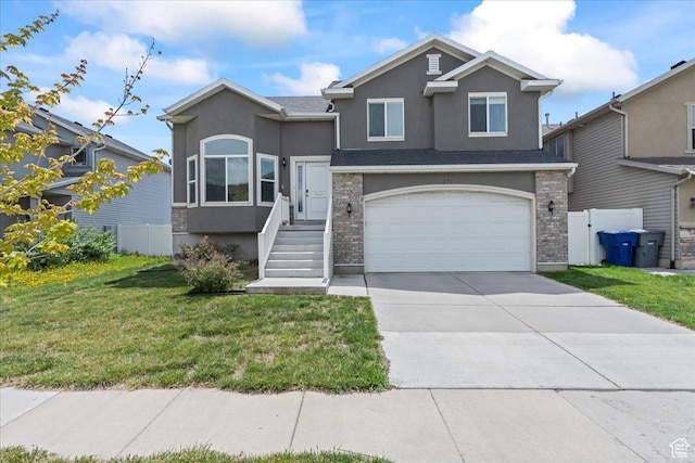 971 W Farnham Dr, North Salt Lake, UT 84054 - view of front of house featuring stucco siding, concrete driveway, and a garage
