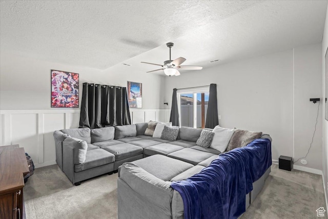 971 W Farnham Dr, North Salt Lake, UT 84054 - living area with light colored carpet, ceiling fan, and a textured ceiling