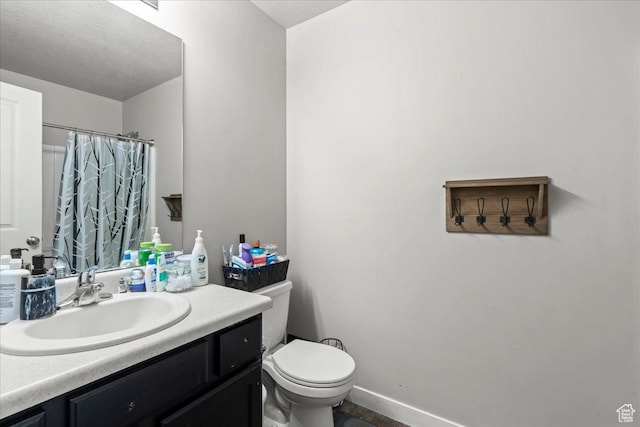 971 W Farnham Dr, North Salt Lake, UT 84054 - bathroom with toilet, vanity, and curtained shower