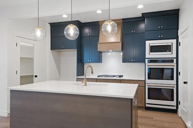 11419 S Watercourse Rd Unit 188, South Jordan, UT 84009 - kitchen featuring white double oven, a sink, built in microwave, gas stovetop, and wood finished floors
