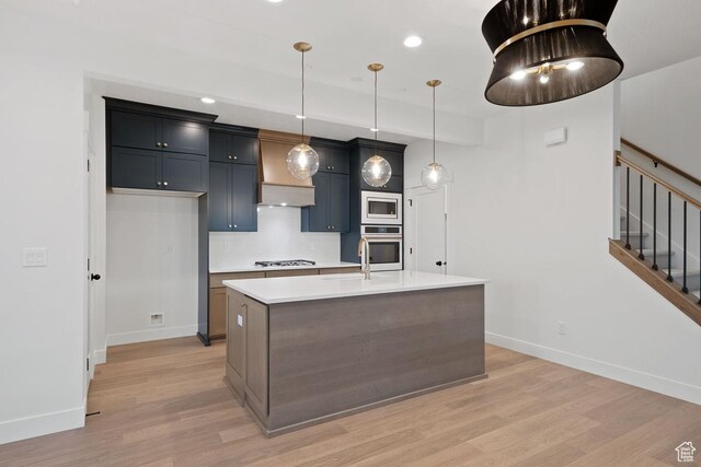 11419 S Watercourse Rd Unit 188, South Jordan, UT 84009 - kitchen with built in microwave, stainless steel oven, baseboards, light countertops, and recessed lighting