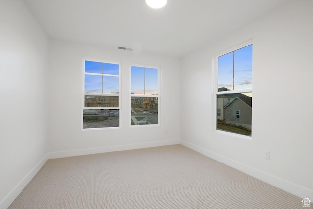 11419 S Watercourse Rd Unit 188, South Jordan, UT 84009 - carpeted spare room featuring baseboards