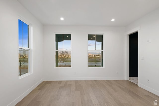 11419 S Watercourse Rd Unit 188, South Jordan, UT 84009 - unfurnished room featuring light wood-style flooring, baseboards, and recessed lighting
