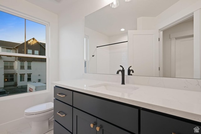 11419 S Watercourse Rd Unit 188, South Jordan, UT 84009 - full bathroom with marble look tile flooring, toilet, vanity, a shower, and recessed lighting