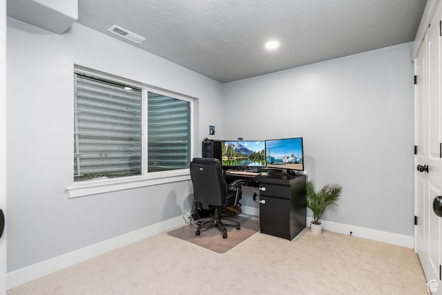 office area with carpet flooring and baseboards