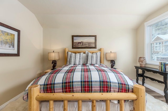 121 Daly Ave, Park City, UT 84060 - bedroom with vaulted ceiling and baseboards