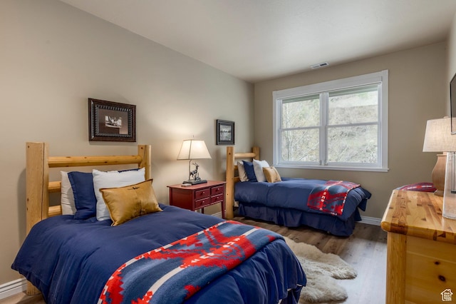 121 Daly Ave, Park City, UT 84060 - bedroom featuring wood finished floors and baseboards