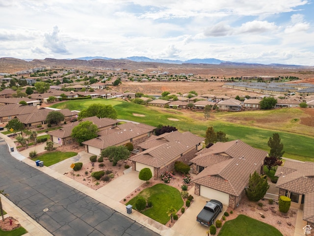 aerial view of residential area with a mountain backdrop