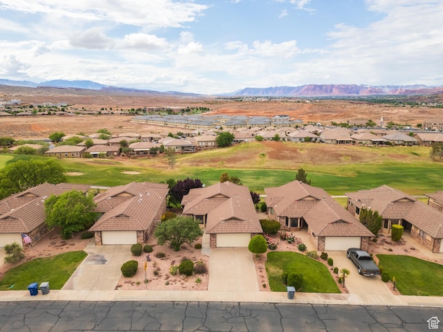 aerial perspective of suburban area with a mountain backdrop