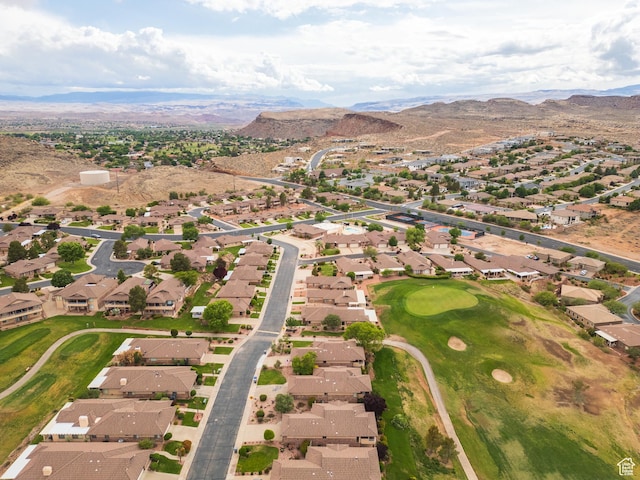 view of property location featuring nearby suburban area and a mountainous background