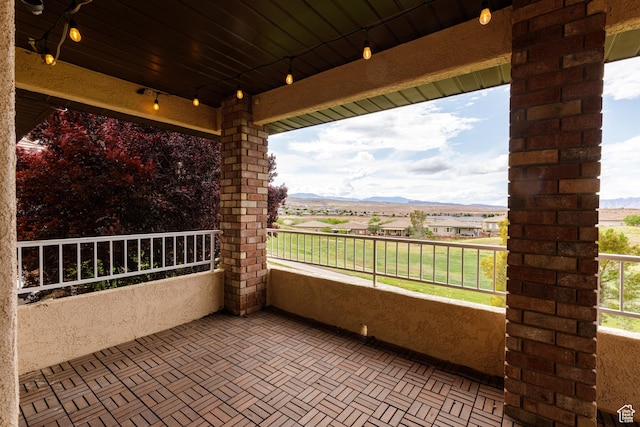 balcony featuring a mountain view