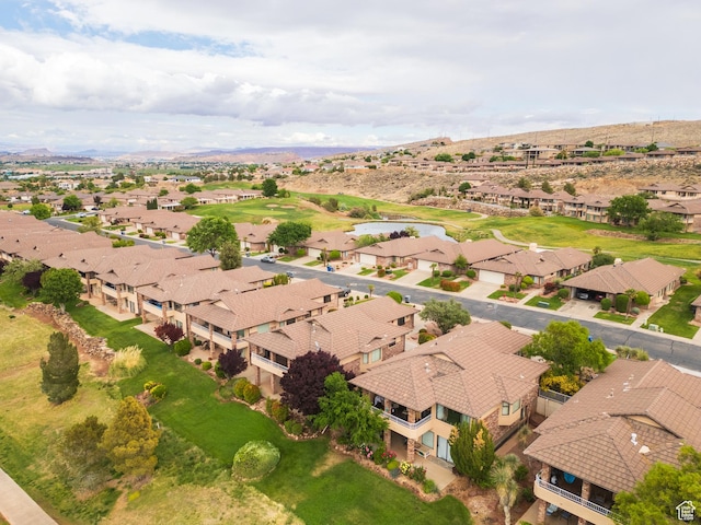 aerial view of residential area with a mountain backdrop