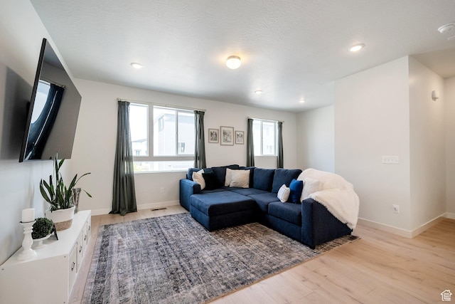 983 W 540 S, American Fork, UT 84003 - living room featuring light wood-style flooring, baseboards, and recessed lighting