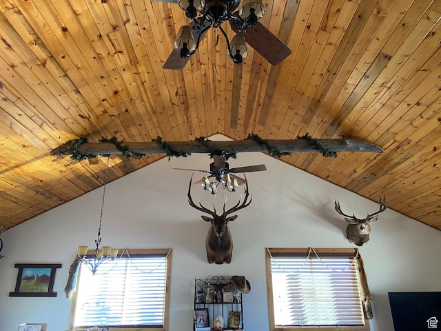 detailed view of ceiling fan, wooden ceiling, and a chandelier