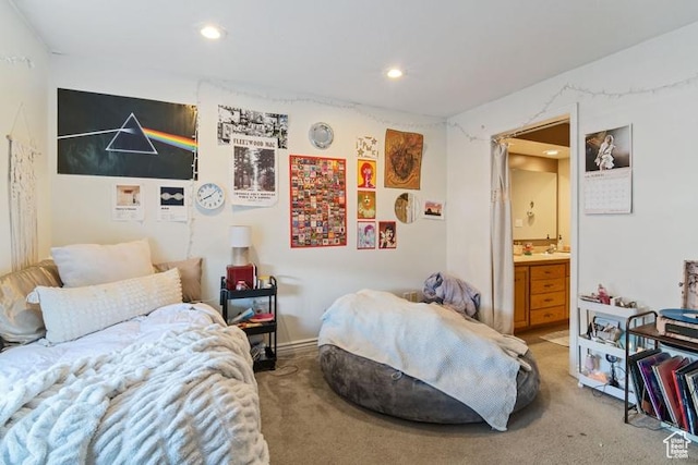 bedroom featuring carpet, recessed lighting, and connected bathroom