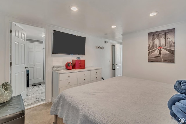 bedroom featuring crown molding and recessed lighting