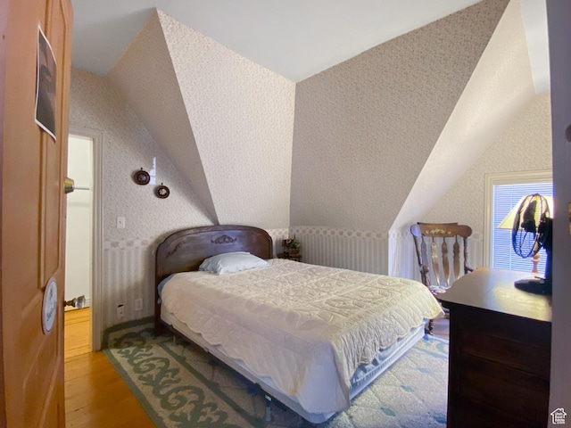 244 S Main St W, Ephraim, UT 84627 - bedroom featuring lofted ceiling, light wood-style floors, and radiator heating unit