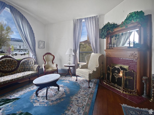 244 S Main St W, Ephraim, UT 84627 - living area featuring a tiled fireplace and wood finished floors