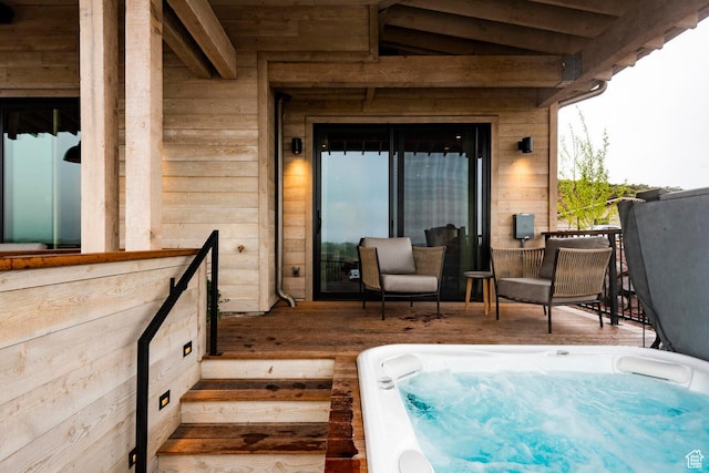view of patio / terrace featuring a hot tub