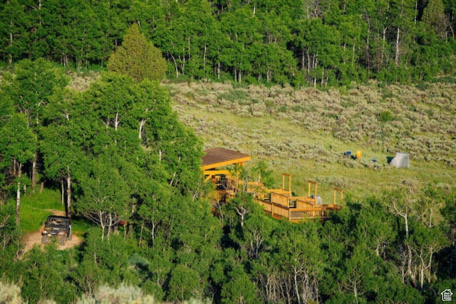 view from above of property featuring a forest