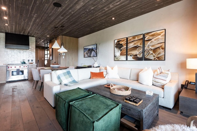 living area featuring wood-type flooring, wood ceiling, and recessed lighting