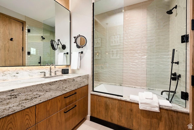full bath with tiled shower / bath and vanity
