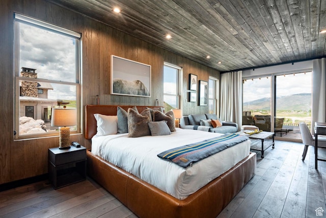 bedroom featuring access to exterior, light wood-style floors, multiple windows, wooden ceiling, and recessed lighting