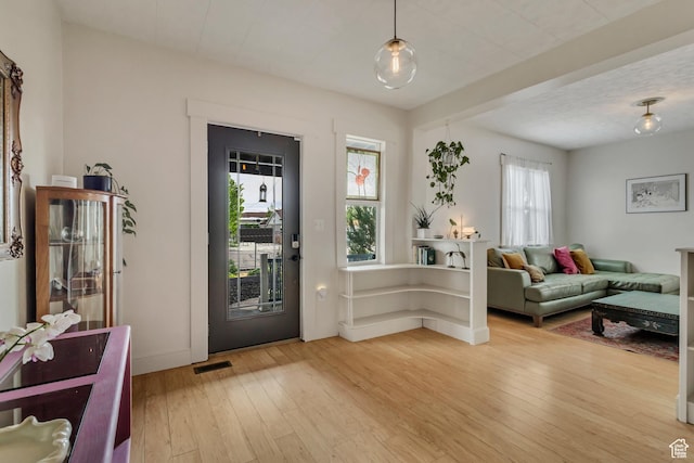 21 E Angelo Ave S, South Salt Lake, UT 84115 - entryway with light wood-type flooring