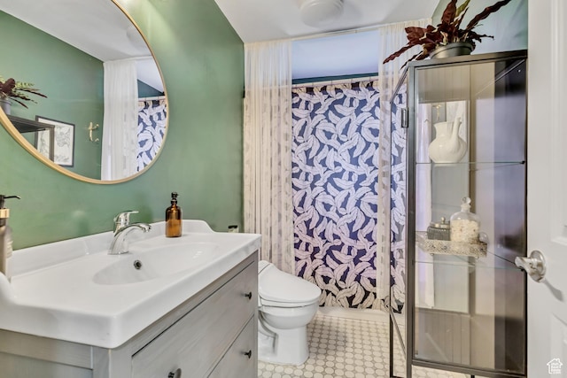 21 E Angelo Ave S, South Salt Lake, UT 84115 - bathroom featuring vanity, toilet, and a shower with shower curtain