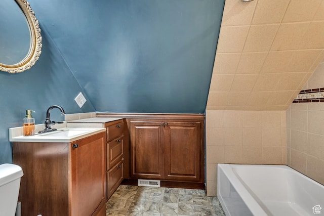 21 E Angelo Ave S, South Salt Lake, UT 84115 - bathroom with a bathtub, toilet, and vanity
