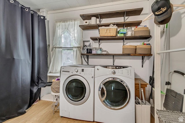 21 E Angelo Ave S, South Salt Lake, UT 84115 - clothes washing area with washing machine and dryer and wood finished floors