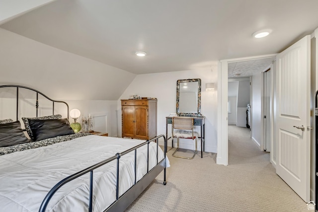 21 E Angelo Ave S, South Salt Lake, UT 84115 - bedroom featuring light colored carpet, baseboards, and vaulted ceiling
