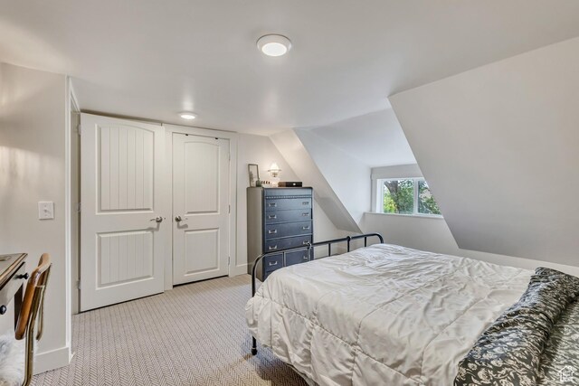 21 E Angelo Ave S, South Salt Lake, UT 84115 - bedroom featuring carpet floors, baseboards, and lofted ceiling