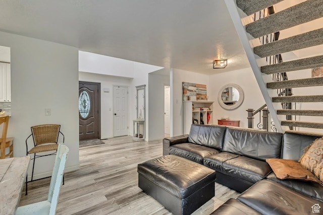 1343 S 200 E, Farmington, UT 84025 - living area featuring light wood-type flooring, stairs, and baseboards